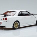 Nissan Skyline GT-R R34 Nismo Z-Tune Baltas MotorHelix 1:18 - image 3 of 11