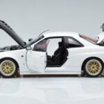 Nissan Skyline GT-R R34 Nismo Z-Tune Baltas MotorHelix 1:18 - image 4 of 11