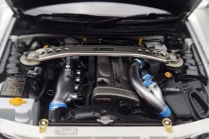 Nissan Skyline GT-R R34 Nismo Z-Tune Baltas MotorHelix 1:18 M83407 Metalas - nuotrauka 9 iš 11