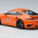 Porsche 911 992 Turbo S China 20th Anniversary Oranžinis Minichamps 1:18 - image 5 of 6