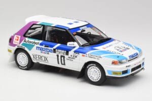 Mazda 323 GTX #10 T. Makinen / S. Harjanne 1000 Lakes Rally 1991 Otto 1:18 OT1099 Derva - nuotrauka 4 iš 6