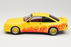 Opel Manta B Mattig Geltonas su Liepsna MCG 1:18 MCG18115 Metalas - nuotrauka 3 iš 6