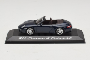 Porsche 911 997 Carrera 4 Kabrioletas Tamsiai Mėlynas Minichamps 1:43 WAP02015216-R1 Metalas