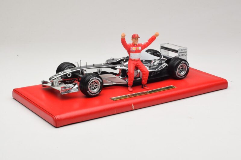 Ferrari F2004 #1 M. Schumacher Six Time World Champion 2004 Chromas Sidabras Hot Wheels 1:18 C7332 Metalas