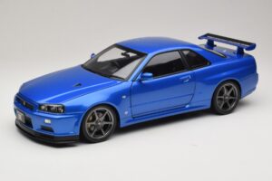 Nissan Skyline GT-R R34 V-Spec II Mėlyna Metalik OEM Ratlankiai KK-Scale 1:12 Nissan Skyline GT-R R34 V-Spec II Mėlyna Metalik OEM Ratlankiai KK-Scale 1:12 KKDC120211-1 Metalas